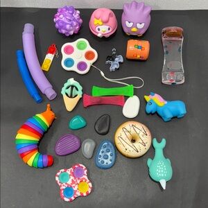 Fidget ASMR pop it toys Hello kitty sensory worry stones and more!